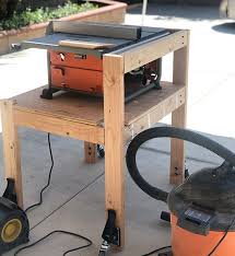 I have a table saw nearly identical to the table saw pictured below. Diy Table Saw Stand With Folding Outfeed Table Plans And Video
