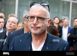 Bob Savenberg pictured during the funeral ceremony of Belgian singer Paul  Severs, Tuesday 23 April 2019, in Sint-Martinus basilica. Paul Severs died  last 9 April at 70. BELGA PHOTO NICOLAS MAETERLINCK Stock Photo