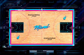 The home uniforms were white with lettering in red, black and orange trim, while the away uniforms were black with red, white and orange trim; Miami Heat Unveil Vice Themed Basketball Court Miami Herald
