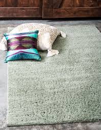 Uv treated to prevent the growth of mold and mildew, these multi purpose area rugs are exceptionally easy to clean. Sage Green 5 X 8 Solid Shag Rug Rugs Com
