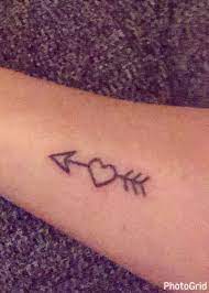 Huge collection, amazing choice, 100+ million high quality, affordable rf and rm images. Heart Arrow Tattoo Cute Small Tattoo Heart Arrow Tattoo Small Tattoos Pretty Tattoos