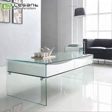 Crafted in a tidy square structure, the logan coffee table is neat and fashionable finished in a stunning white high gloss. Curved Glass Coffee Table With White High Gloss Painting Drawers China Coffee Table Glass Table Made In China Com