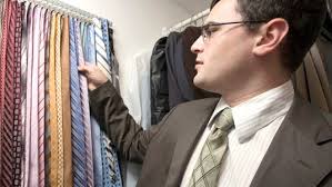 Young guys choose ties for a style statement