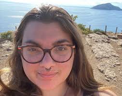 A month before she graduated high school, Judith Cusack earned her  associate's degree in criminal justice. Now, as a third-year student triple  majoring in history, sociology and psychology with a minor in