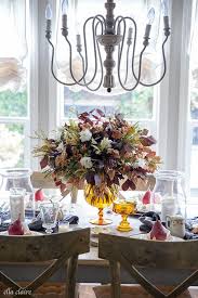 Fall color has a distinct look but if you'd like to add a pretty twist with a feminine touch to your autumn color palette, check out this fall tablescape. Warm Fall Tablescape Budget Friendly Ella Claire Co