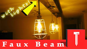 A beamed ceiling features exposed joists or beams which can create visual interest and bring individual flair to your home. How To Make Exposed Ceiling Beams Faux Wood Beam Youtube