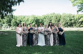 Floral And Pastel Bridesmaid Dresses For Spring Or Early Autumn Weddings Bride And Her Bride Tr Rustic Bridesmaid Dresses Rustic Dresses Rustic Wedding Photos
