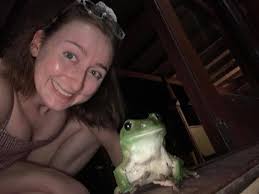 What's the reason for the cat's unusual sitting position?