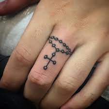 Which finger you choose is up to you. 25 Rosary Cross Tattoos On Fingers