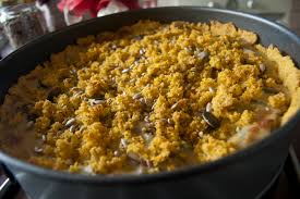 To assemble the cakes place fried polenta on platter, top with some of the caramelized onions, goat cheese crumbles, walnuts, thyme, and drizzle with honey. Savoury And Vegan Polenta Cake