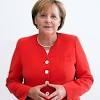 Mrs merkel using the hand sign in berlin on april 12. 1