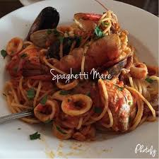 A Tender Seafood Medley Of Squid Mussels Clams Fish And Prawns Sauteed In Olive Oil Garlic Marinara Seafood Medley Recipes Seafood Medley Olive Oil Pasta