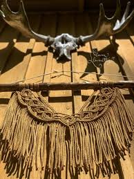 The light, natural tone of the wood and unbleached cotton would work well with any boho bedroom design and add a whimsical touch. Macrame Wall Hanging Prince Video Tutorial With English Captions