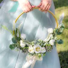 Figure out your design, buy vases and floral supplies, practice, buy your wedding flowers right before the wedding, put centerpieces together, and have enough space in a vehicle to transport. Diy Floral Hoop Arrangement The Koch Blog