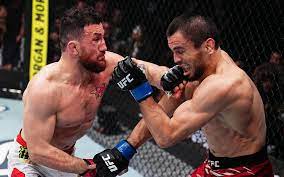 Merab Dvalishvili fait tomber Umar Nurmagomedov et conserve son titre à  l'UFC 311 - Arts Martiaux Mixtes