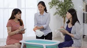 Find out everything you need to know about parenting. Asian Japanese Expectant Mom In Blue Dress Taking Parenting Class With Her Friend And Asking Questions To Nurse Stock Photo Picture And Royalty Free Image Image 160319181