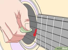 How to choose and hold a pick justinguitar com. 3 Ways To Hold A Pick Wikihow