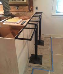 The frame extends up to 2 inches over the cabinet opening, adding strength and sturdiness to the construction. Welding The Frame That Will Support Both Countertop Stone Overhang And Swing Stools In My Kitchen Baseplate With Beam House Stone Flooring Stone Countertops