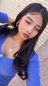 Latina Girl with Straight Hair and Green Shirt