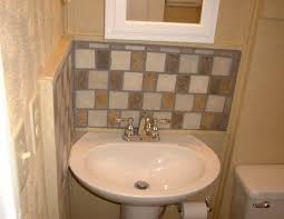 As seen in the picture, the blue tiles breathe life to the white and wooden bathroom, becoming the most stand out feature. 725 Old Orchard Avenue Pedestal Sink Backsplash Pedestal Sink Backsplash Ideas Sink