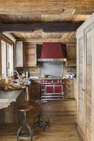 Home Decor Rustic Style Notice How The Red Stove Stands Out Against The Natural Woodwork In This Ski Chalet Casa Rustica Casa Di Legno Sala Rustica