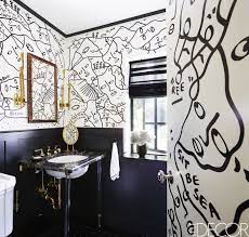 Combined with the black accent wall, the white black themed bathroom. This Colorful Ranch In Upstate New York Is Full Of Modern Artwork White Bathroom Decor Bathroom Design Decor Bathroom Interior Design