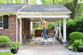 Once the base color is dry to the touch, use painters' tape to mark your pattern. Building A Garage Or Carport Pergola Young House Love