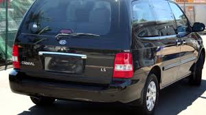 The kia carnival is a minivan manufactured by kia, introduced in january 1998, now in its fourth generation and marketed globally under various nameplates — prominently as the kia sedona. 2004 Kia Carnival Kv11 Ls Black 4 Speed Automatic Wagon Youtube