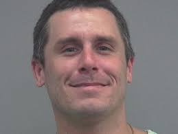 Jail inmate charged with threatening phone calls