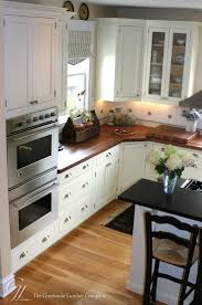 kitchen floors with white cabinets
