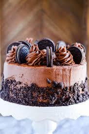 This recipe for oreo cake is made with a delicious chocolate cake and a light, airy oreo whipped cream frosting. Cookies Cream Chocolate Layer Cake Recipe Something Swanky