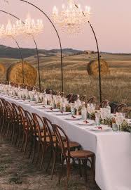 I would love to have an italian dinner party at my house because when my mother was alive, she always cooked fantastic italian food on christmas eve for our big parties. An Intimate Tuscan Wedding Featuring A Hillside Reception Under Sparkling Chandeliers Green Wedding Shoes