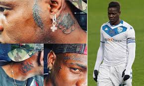 Say what you will about foden's platinum 'do, it's not the only euro 96 look we think is ripe for a revival among the england squad… Mario Balotelli Shows Off Five New Tattoos With The Striker Getting The Words Black Power Inked Daily Mail Online