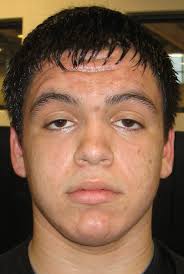 West Ottawa heavyweight Miguel Correa no lightweight wrestler