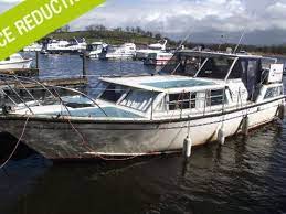 Has a sun canopy and two 115 yamaha's in perfect running condition. Buy Moonraker Softrider Aft Cabin Moonraker Softrider Aft Cabin For Sale