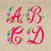 Personalize gifts with a free relaxed script monogram embroidery patterns. 2 05