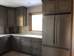 Medallion Kitchen Appaloosa Collection Silver Appaloosa Knotty Alder Antique Distressing Peppered S Diy Kitchen Remodel Kitchen Design Built In Dishwasher