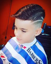 barber leo cabrera corte con diseño para niños