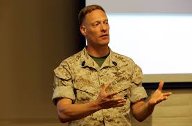 Camp Pendleton - CAMP PENDLETON, Calif. -- Master Sergeant Brad Colbert speaks to Headquarters and Support Battalion Marines about emotional intelligence at the 1795 Unit Event Center, June 20. Colbert is best