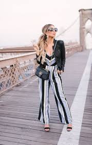 Black And White Striped Jumpsuit With Jacket Jumpsuit Leather Jacket In Nyc Leather Jacket Outfits Fashion Oversized White Knit Sweater