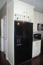 While remodeling his kitchen, michael hubbs realized that the cabinet above the fridge was wasted space—hard to see into and harder to reach. Wine Cabinet Over Fridge Off 50