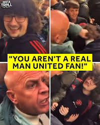 Manchester United fan Frank, who's growing his hair out until the team win  five games in a row, had his hair pulled by another supporter who claimed  “he's not a real United