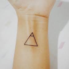 20 Tiny Tattoos With Big Meanings Small Tattoos With Big Meanings Glyph Tattoo Tattoos