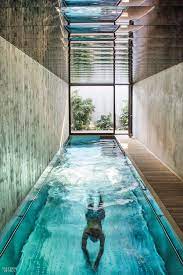 Here are some cool ideas on how to achieve the perfect pool in your backyard. 4 Modernist Homes In Europe Get A Makeover Indoor Swimming Pool Design Dream Pool Indoor Indoor Pool Design