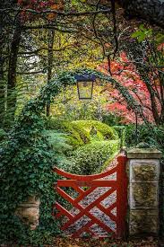 Red Door Garden To Mother Nature Cottage Garden Cottage Garden Design Garden Arches