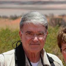 A young lad climbing the flag pole at Yasser Arafat Square symbolizing  Palestine's struggle to become a nation.