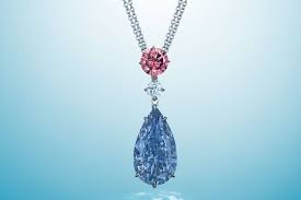 Maybe you would like to learn more about one of these? Fancy Vivid Blue Diamond Necklace Fetches 20 5 Million Barron S