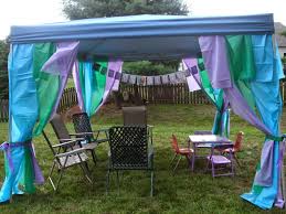 Backyard Pop Up Tent Decorated With Strips Of Plastic Tablecloths Don T Like The Colors Brave Birthday Party Cute Birthday Ideas Mermaid Birthday Decorations