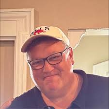 Did the Bosa brothers' father play for the Dolphins?