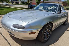 Image result for Platinum Opal 1995 Mazda